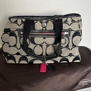 Grey and black Coach purse